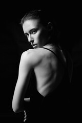 Beautiful sexy Girl in Dress with naked back. Black and white portrait - 776302847