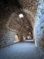 Obraz premium Medieval Crusaders Castle in Al Karak - Jordan, Al Kerak fortrest in arab world served as a fort for many centuries, historical ruins on a mountain above the city