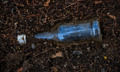 Vergrabene Glasflasche
