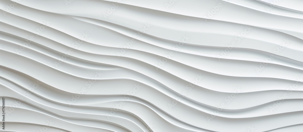 Poster close-up view of a white wall featuring a unique wave pattern design, adding a modern touch to the b
