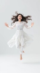 Naklejka premium Portrait of smiling young Asian woman, isolated on white background. Full body.