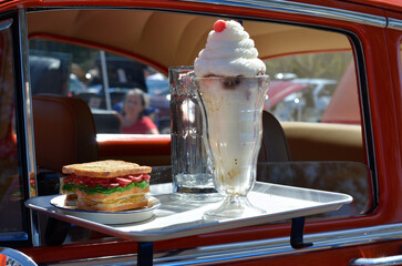 Milkshake with Cherry on Top and Sandwich on Antique Car in Gainesville FL