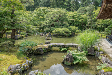 Beautiful scenery found in Gingaku Zen garden.
Peaceful pond garden located in Kyoto, Japan. 

