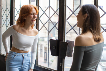 two young women enjoying a conversation