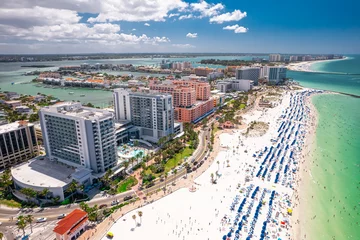 Papier Peint photo autocollant Clearwater Beach, Floride Clearwater Beach Florida. Florida beaches. Panorama of city. Spring or summer vacations. Beautiful view on Hotels and Resorts on Island. Blue color of Ocean water. American Coast. Gulf of Mexico shore