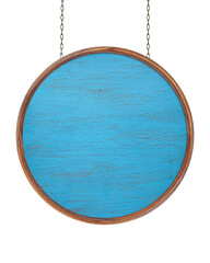 Wooden empty dirty sign hanging on iron chains. Round frame with blue wooden surface. Signboard...