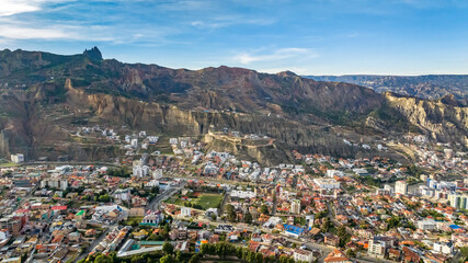 Fototapeta premium La Paz, Bolivia, aerial view flying over the dense, urban cityscape. San Miguel, southern distric