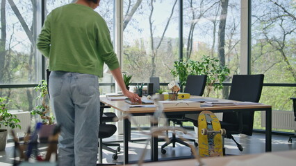 Relaxed woman opening laptop starting work office. Asian businesswoman working