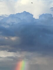 Obraz premium Rainbow and clouds in the sky