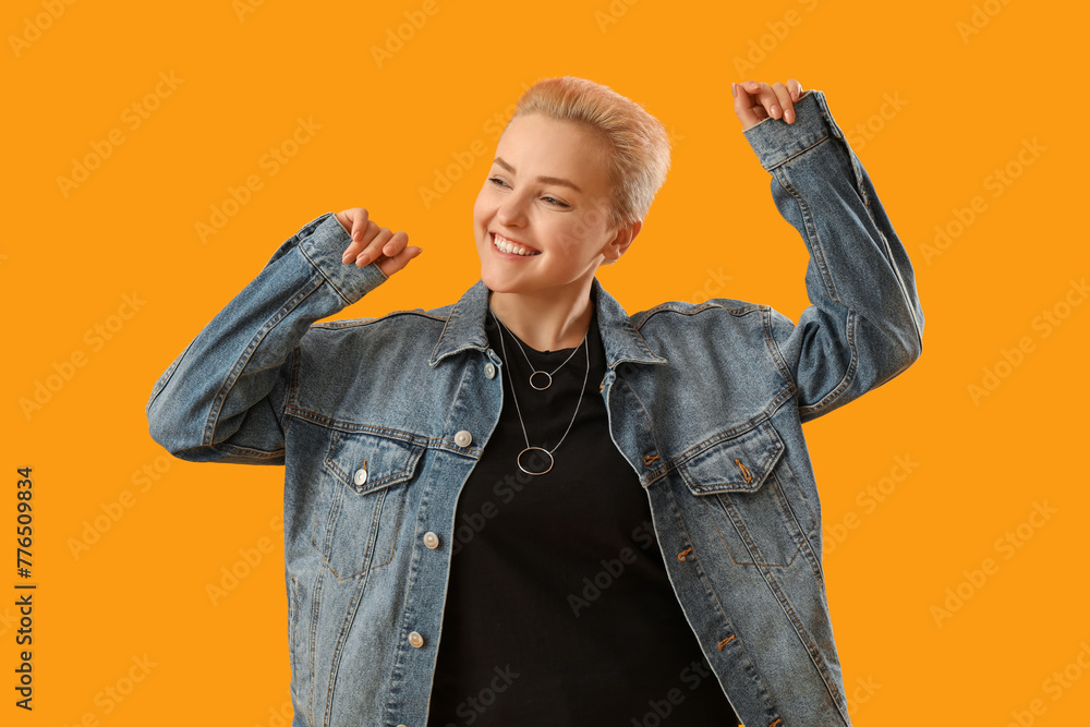 Sticker young woman with short hair dancing on yellow background