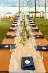 Table set for wedding reception in marquee