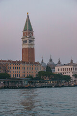 Fototapeta na wymiar View from sea of Piazza San Marco Campanile and Doge Palace on a hazy winter evening, Venice, Veneto, Italy