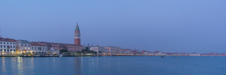 Fototapeta na wymiar Panoramic view from sea of Piazza San Marco Campanile and Doge Palace during blue hour, Venice, Veneto, Italy