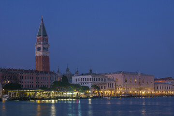 Panoramic view from sea of Piazza San Marco Campanile and Doge Palace during blue hour, Venice, Veneto, Italy - obrazy, fototapety, plakaty