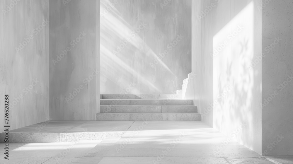 Aufkleber A large, empty room with a staircase leading up to a balcony. The room is filled with light, creating a bright and airy atmosphere