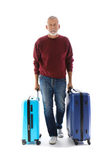 Senior man with suitcases isolated on white background