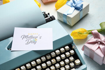 Festive postcard on typewriter for Women's Day on light blue background