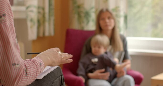 Child's challenges with autism spectrum disorder ASD are addressed during consultation. Specialist provides detailed insight into child's unique needs and potential interventions. Early intervention.