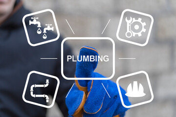 Technician plumber using virtual touchscreen presses word: PLUMBING. Concept of maintenance, fix, plumbing water services.