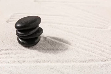 Fototapeten Stack of stones on sand with lines in Japanese rock garden. Zen concept © Pixel-Shot