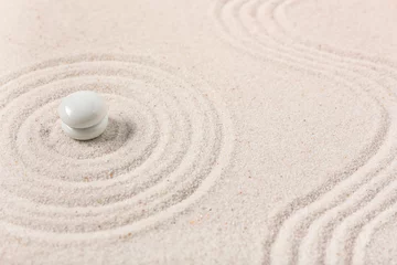 Wandaufkleber Stones on sand with lines in Japanese rock garden. Zen concept © Pixel-Shot