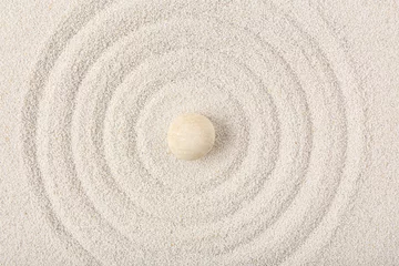 Poster Stone on sand with lines in Japanese rock garden,  top view. Zen concept © Pixel-Shot