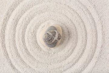 Zelfklevend Fotobehang Stack of stones on sand with lines in Japanese rock garden,  top view. Zen concept © Pixel-Shot