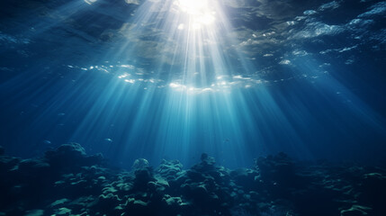 Obraz na płótnie Canvas Underwater Sunlight Beams Casting on Rocky Seabed