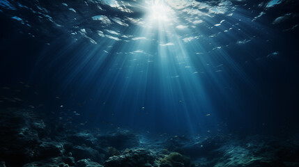 Sun Rays Filtering Through Ocean Water Over Rocky Bottom - obrazy, fototapety, plakaty