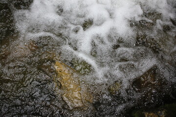 Bubbling water in the brook.
