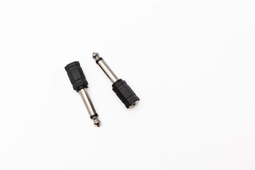 Audio cable adapters on white background