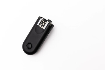 Black universal remote control on white background