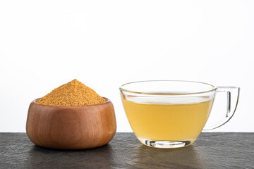 Cup with hot drink from Peruvian maca - Lepidium meyenii