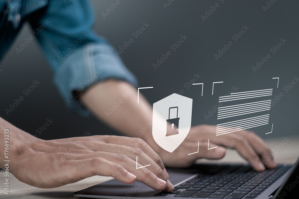 Poster data protection and internet security concept, businessman using laptop with shield protect icon on 