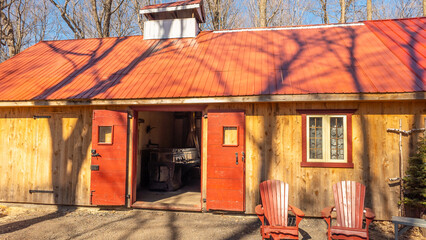 Sugar shack in a Quebec maple grove on a beautiful spring day - 776702261
