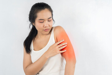 A woman with a red arm is holding her arm.