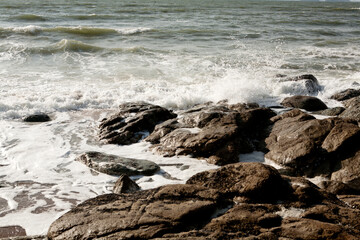 rocks and waves on the beach