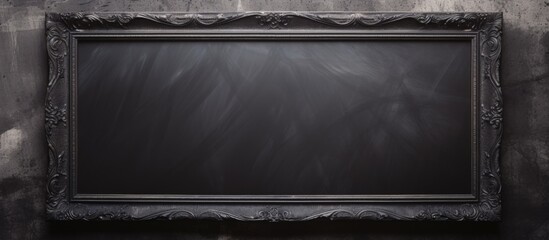 A traditional blackboard with a chalkboard partition dividing it into two sections for writing and drawing activities