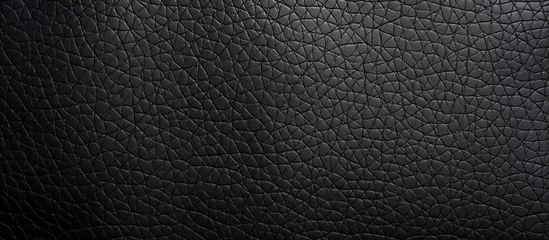 Deurstickers Luxurious black leather background featuring a sophisticated pattern of small squares, adding an elegant touch to any design project © AkuAku