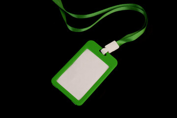 Green badge isolated on black background.	