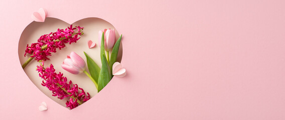 Elegant Mother's Day theme: Top view of tulips, , and paper hearts in a heart-shaped frame on pastel pink background, perfect for greeting text or ads