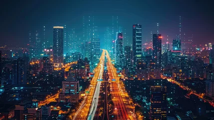 Foto op Canvas an aerial view of a city at night with lots of buildings and a highway © AlexanderD
