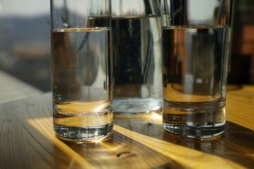 two glasses of still water - obrazy, fototapety, plakaty