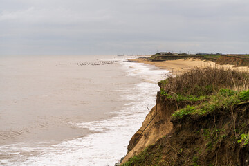 A stormy day on the beach in Happisburgh, Norfolk, England, UK