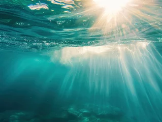 Stoff pro Meter Close up underwater photo of giant waves in the middle of the ocean with bright sunlight breaking through them, turquoise color of water © shooreeq