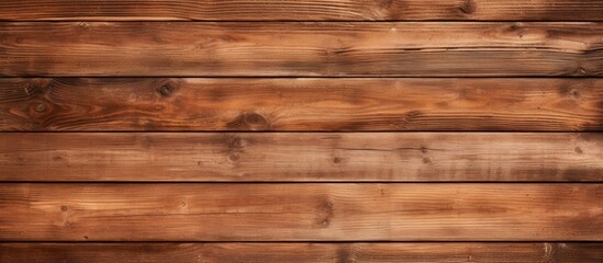 Detailed view of a wooden wall showing its texture and color with a dark brown stain applied on the surface