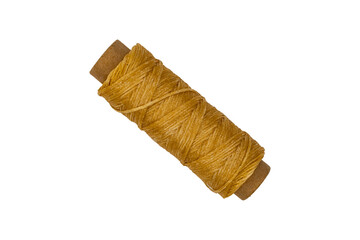 Spool with beige threads isolated on transparent background.