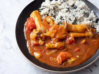 Curry and rice on a plate	