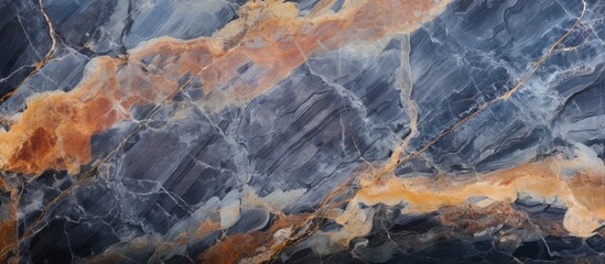 Marble surface captured in a close-up view, showcasing a striking combination of dark blue and orange hues