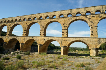 Pont du Gard famous aqueduct arched bridge, popular tourist landmark in France